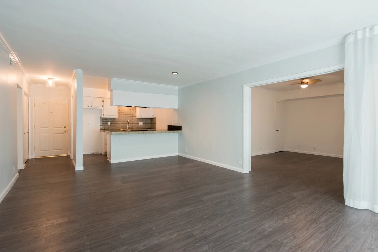 Kitchen, Living Room, Guest Bedroom - After