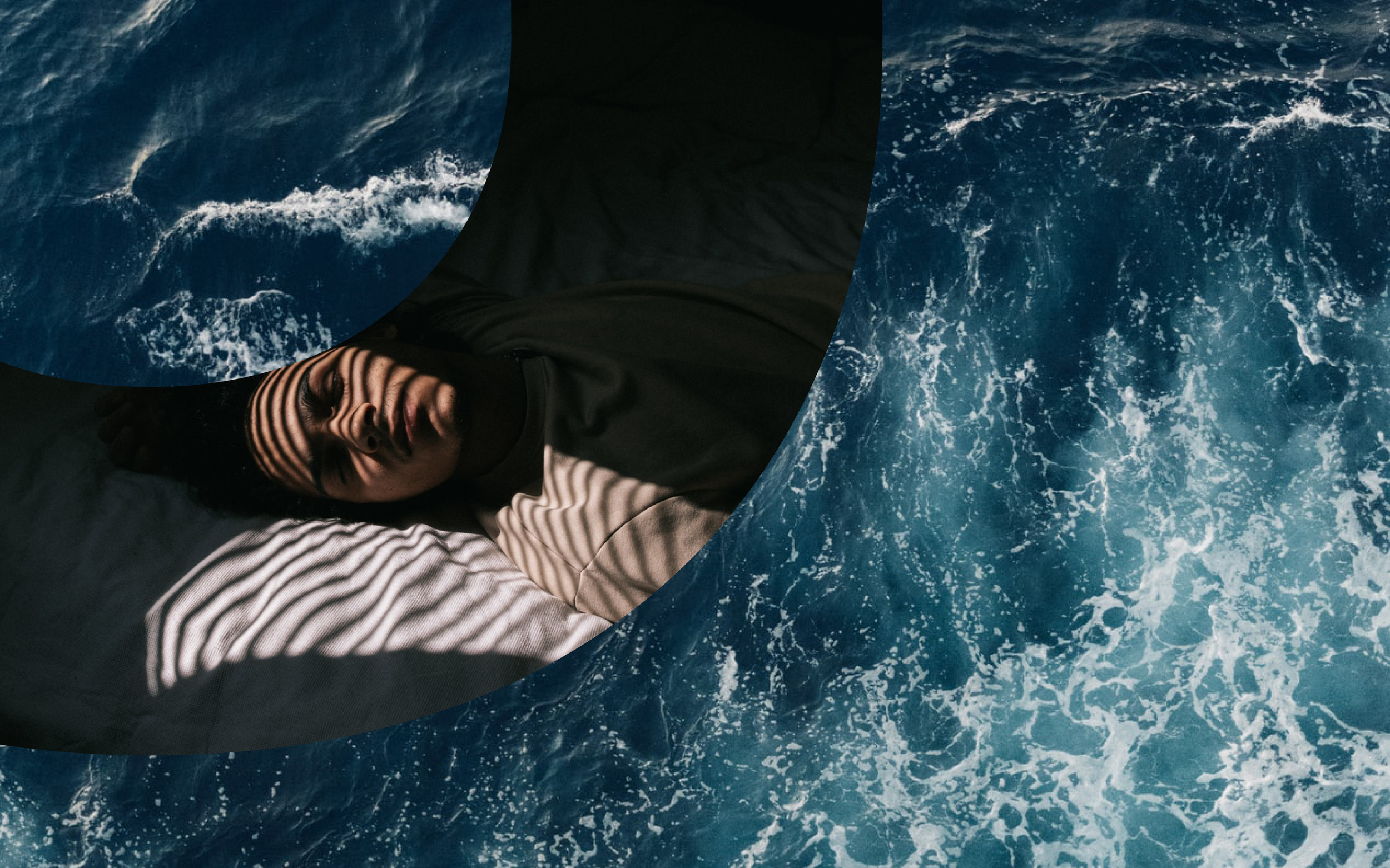 Woman with eyes closed, background of waves in the sea