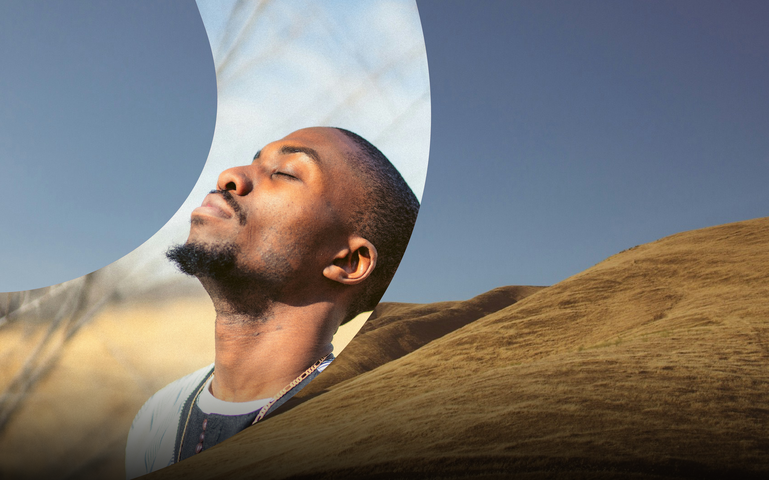 Man with eyes closed, background of still mountains