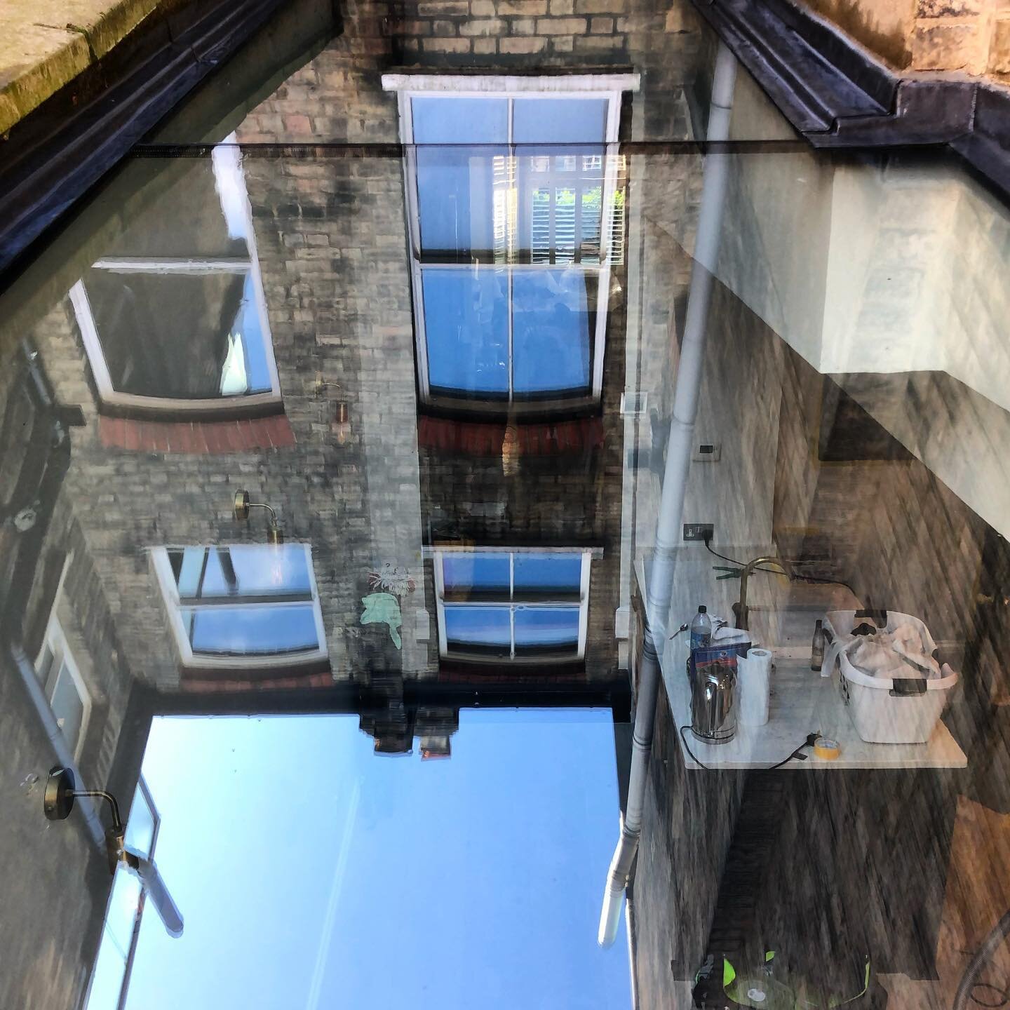 A very dirty kitchen skylight now with a perfect reflection