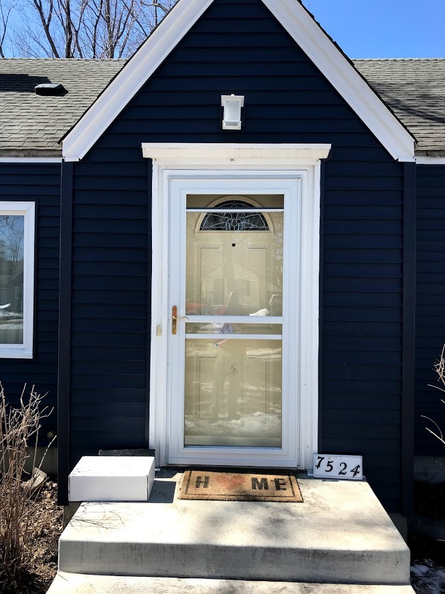 7524 front door with after siding.jpg