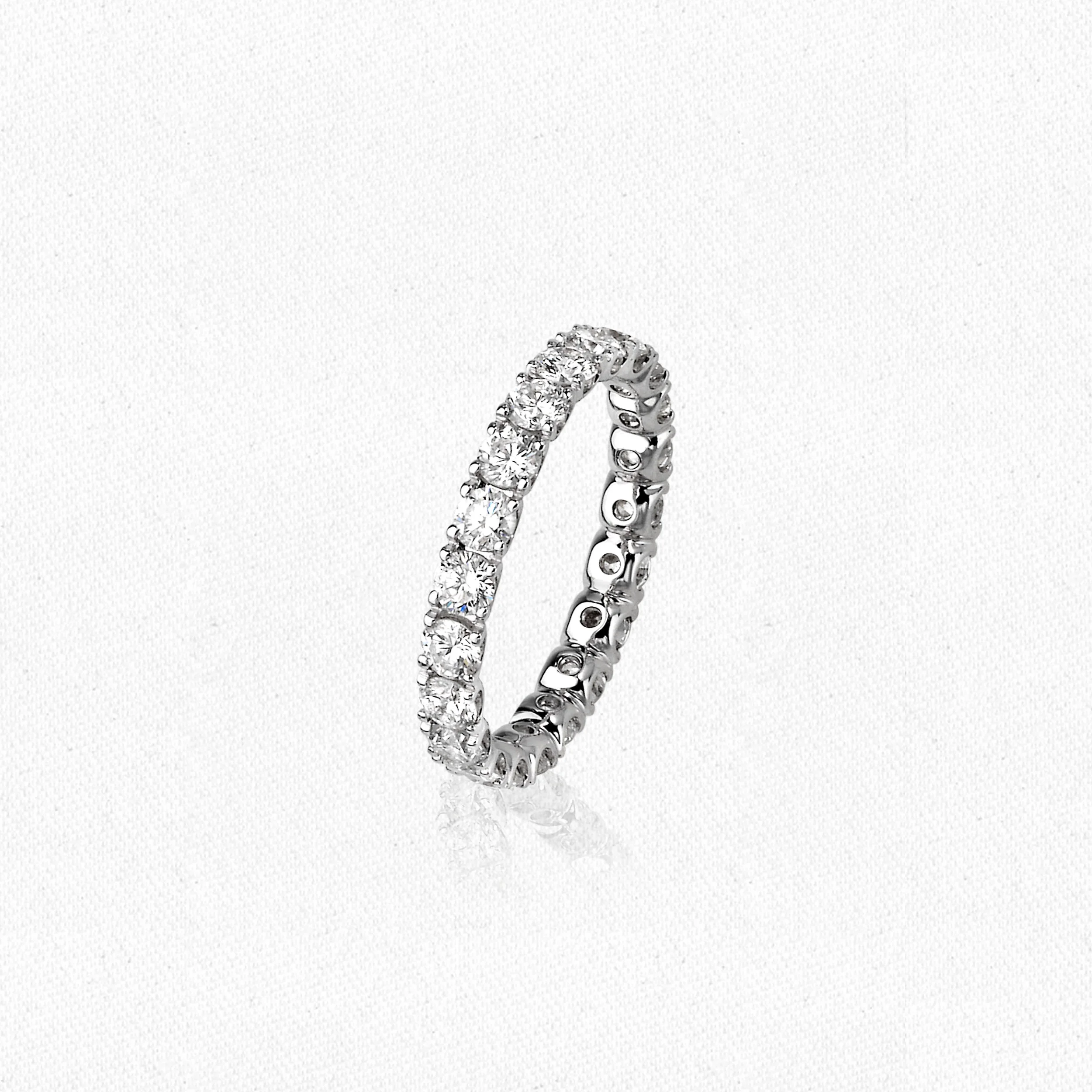 'U-Claw' full circle eternity band with round brilliant cut diamonds