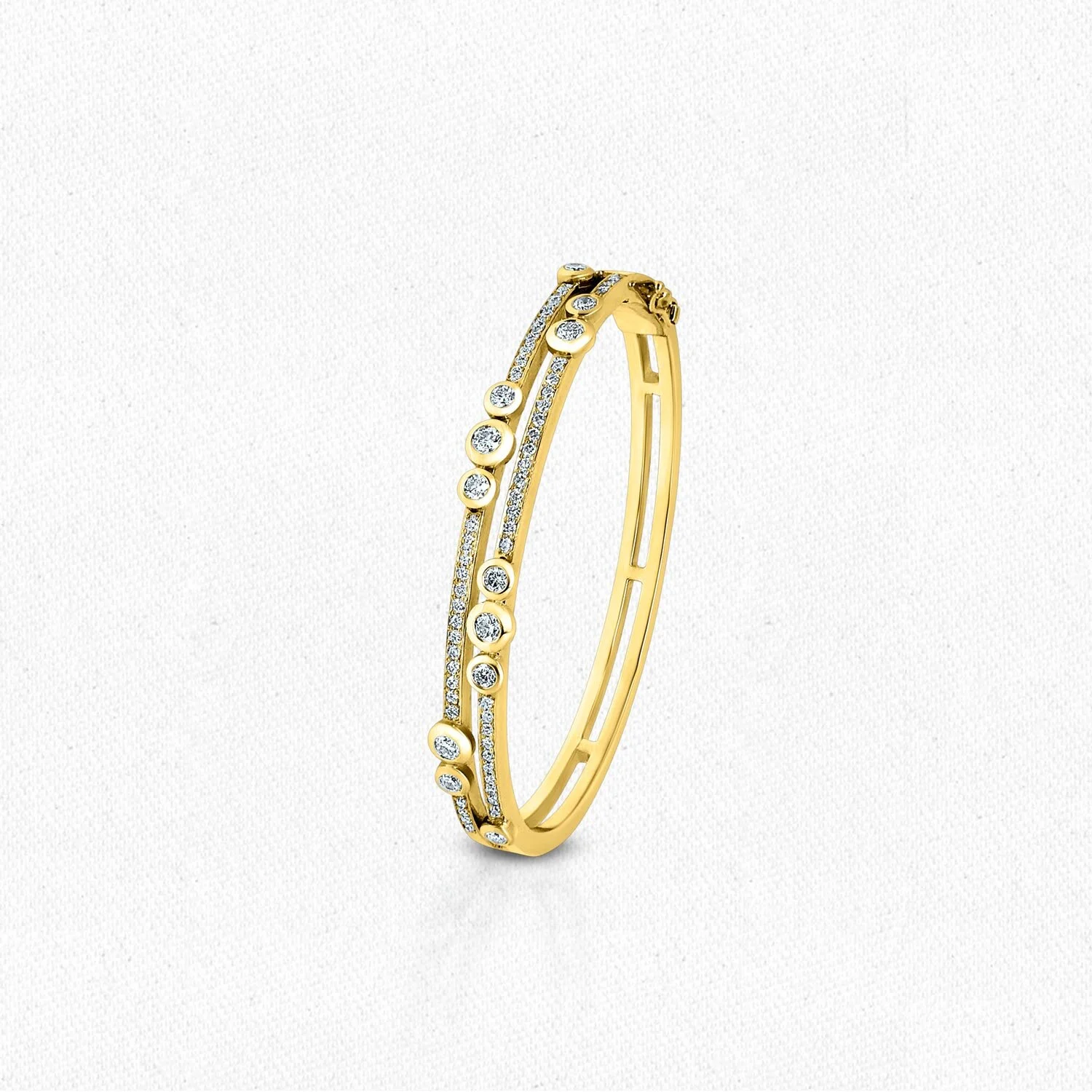 Double row diamond bangle with bezel set diamonds