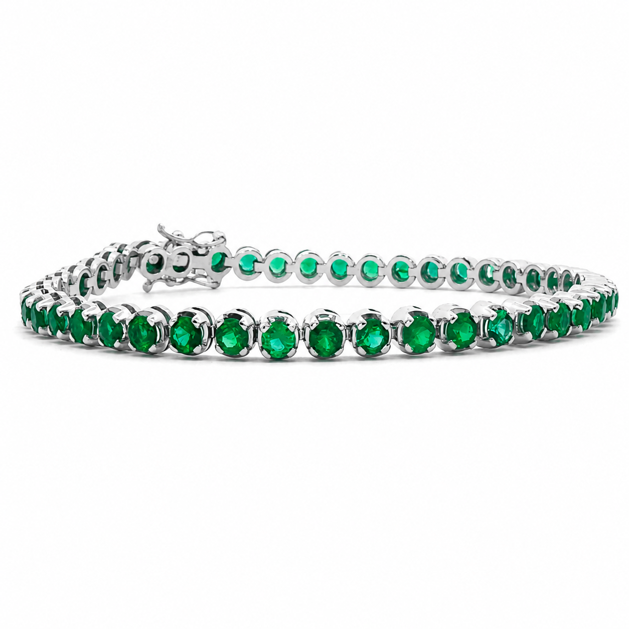Green emerald tennis bracelet.png