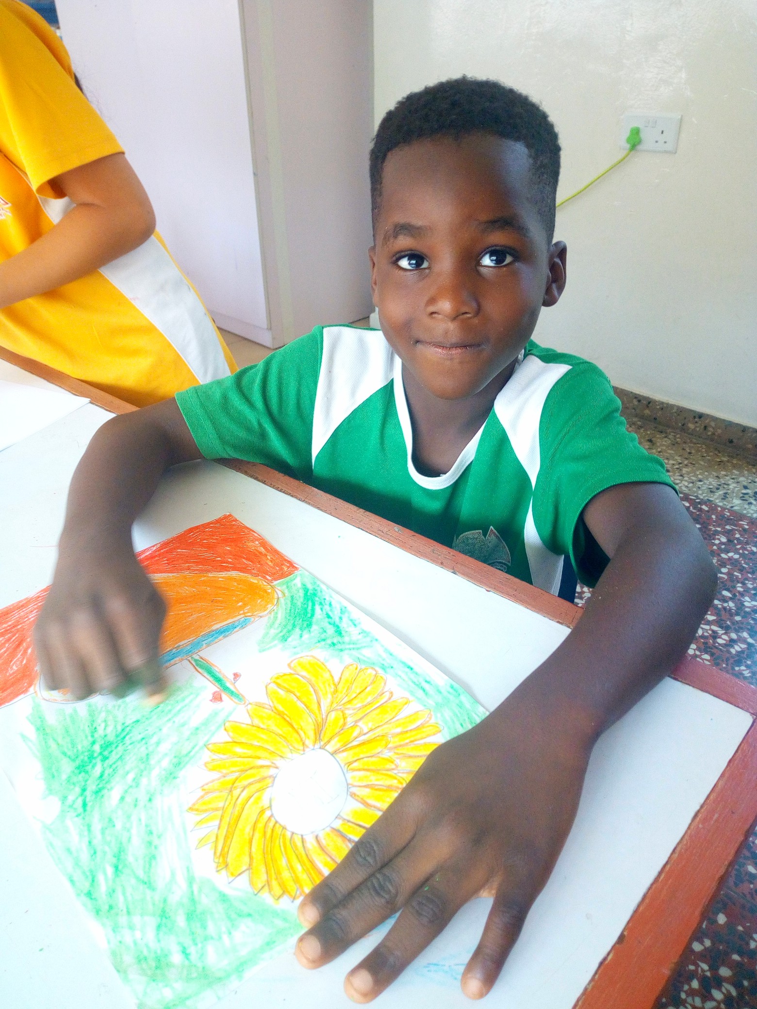 First graders drew their version of “Sunflowers” by Vincent van Gogh in art class.