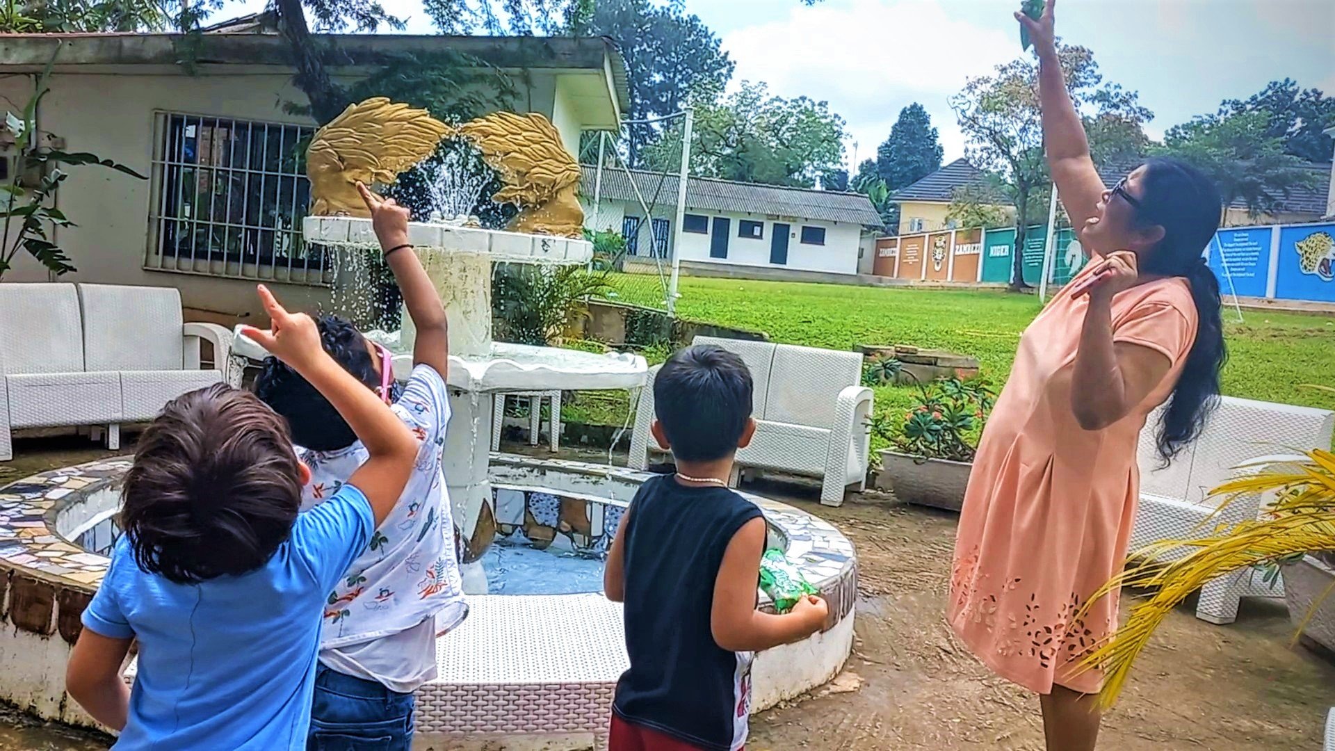  Pre-Kg and Kg: "English-as-a-Second-Language" students took a trip outside with Ms. Seema, to learn English vocabulary associated with "a sunny day." 