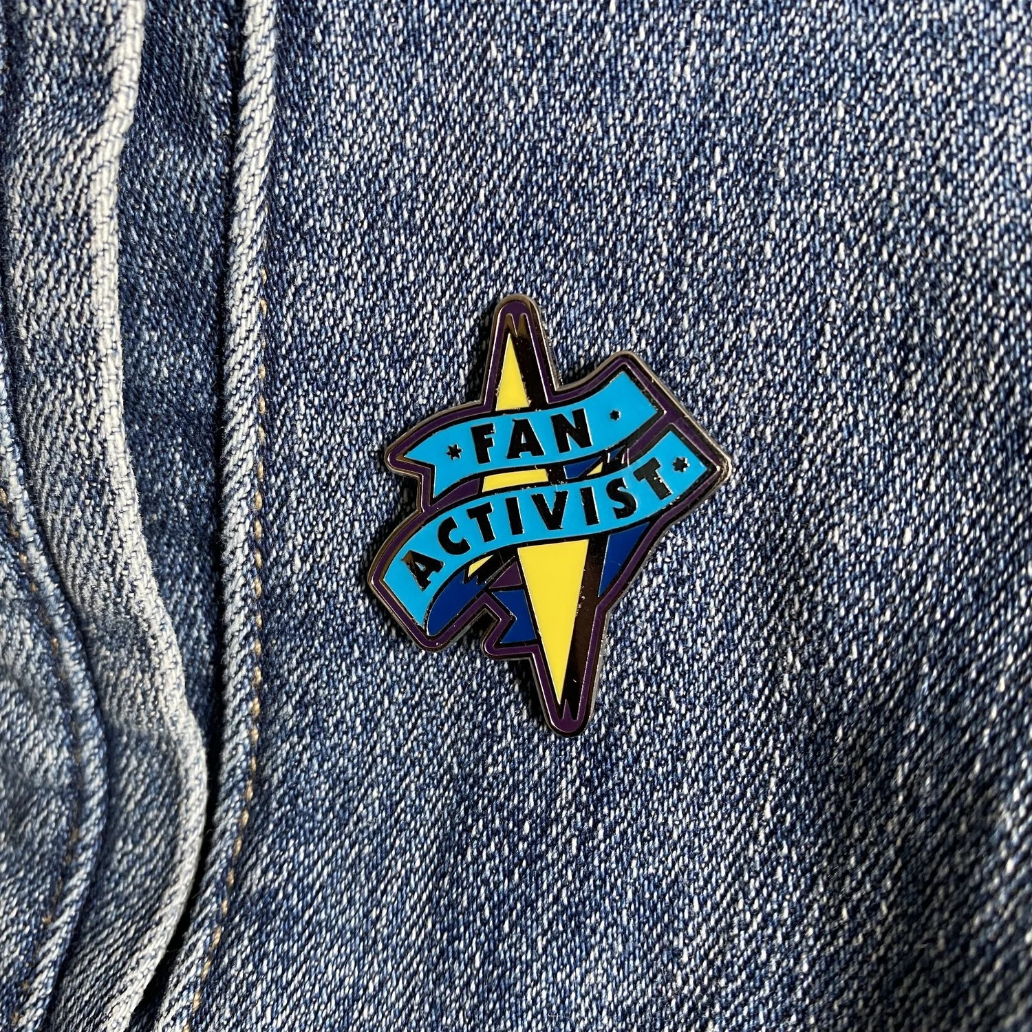fan activist pin.jpeg