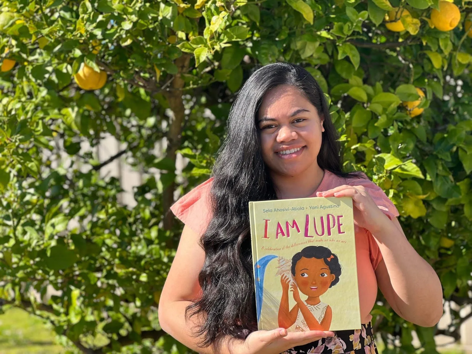 Headshot of Sela Ahosivi-Atiola