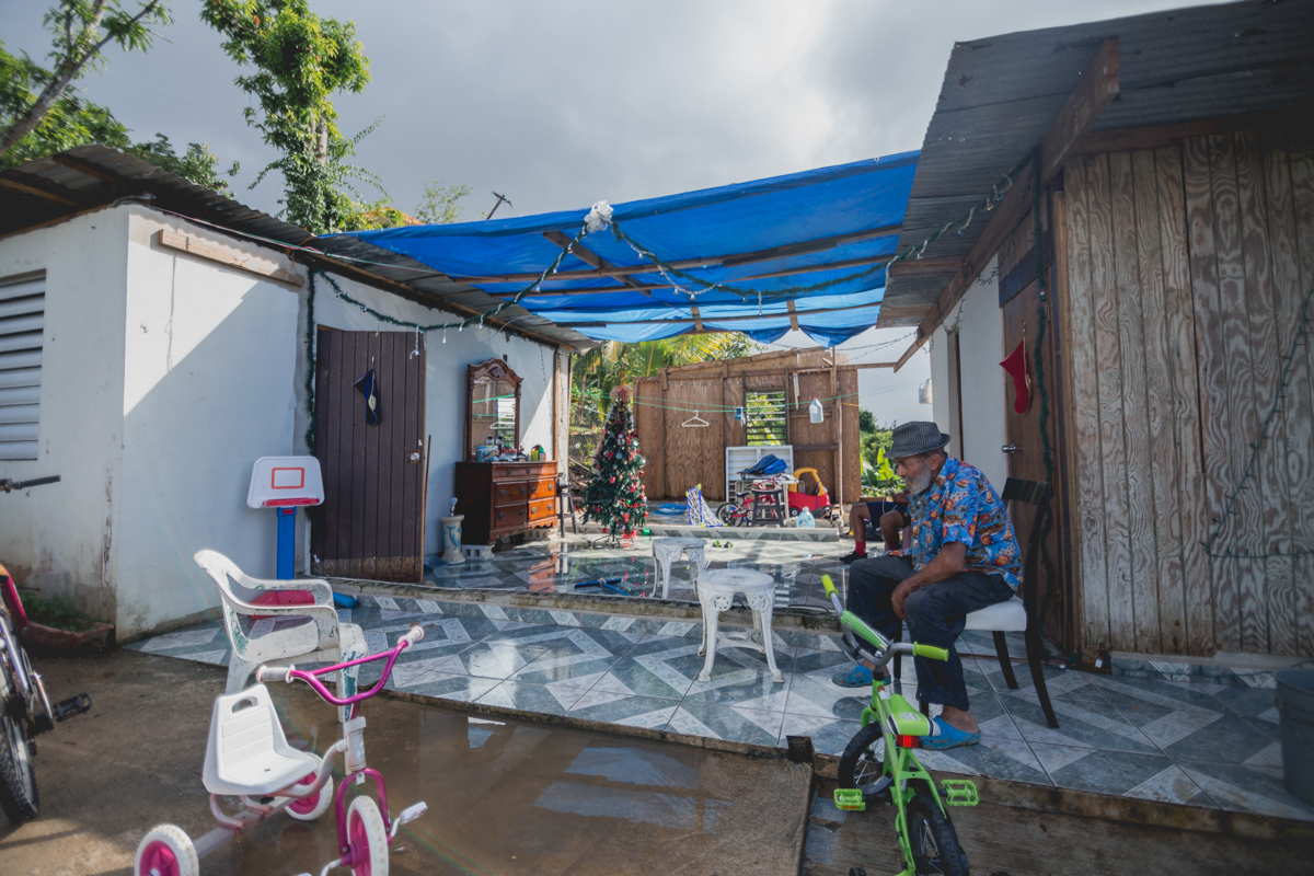 Virginia (39) and her son Oscar Manuel (3), spend their afternoon in what is left of their home, a two-walled house without a roof. During the months following the hurricane, not having a roof became very problematic during very sunny days, or the daily rainstorm. Virginia and Oscar have twice already visited the hospital for suffering severe sunburns. Virginia now has some blue tarps for a roof - placed by the support of a religious organization. December 27, 2017