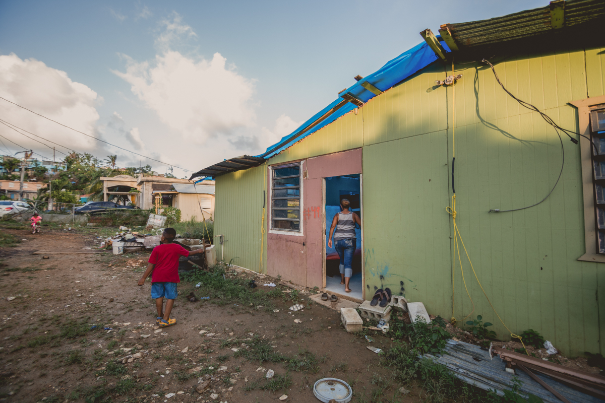 In a neighborhood within Canóvanas - located in the northeastern region of the island - the Olea family stands strong refusing to leave. During the past four months over fifteen families have left their neighborhood due to the unsanitary and virtually uninhabitable conditions. What is left of their neighborhood is now surrounded by wet mud and debris with dwellings covered by blue tarps. December 27, 2017.