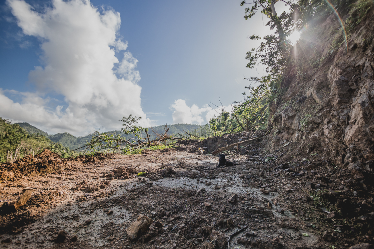 On December 28, 2018 this road was still completely impassable since the storm, on September 21, 2017. This road provided access to one house with several families residing in it, whom had to cross the river in order to get to town for 4+ months. December 28, 2017.