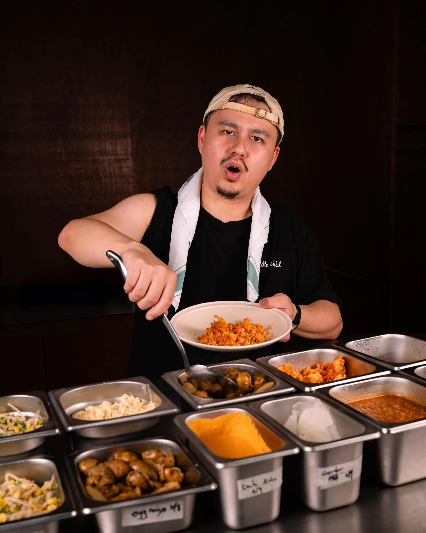 Choose your dishes, stack your plate. Except this cai png comes with ssamjang, craft beer, and a dashingly handsome cai png uncle.