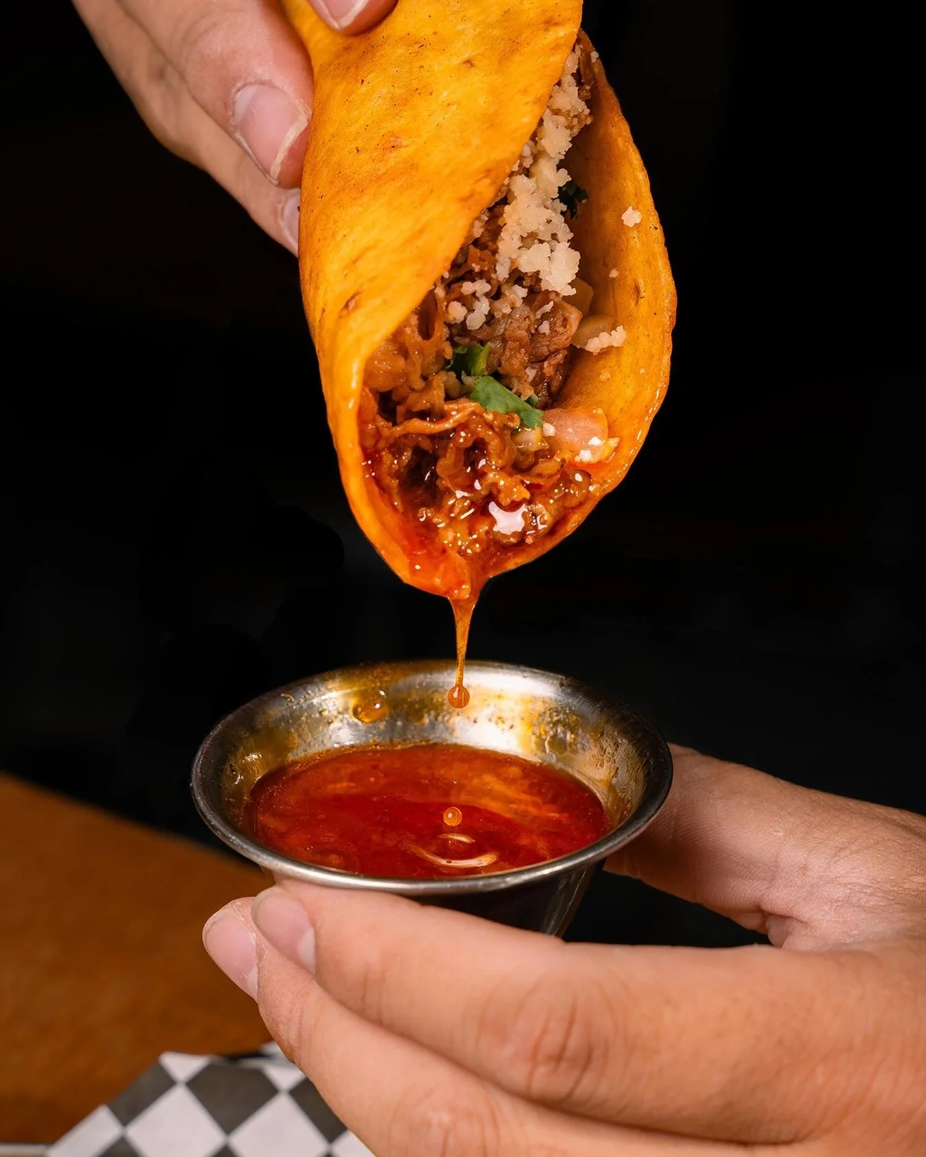 Yukaejang is one of Korea&rsquo;s most comforting dishes, a slow-cooked spicy beef soup, deep in flavour and heavy on the soul. We took that broth, reduced it down into something thicker, richer, and built a birria taco around it. Beef shortplate, on