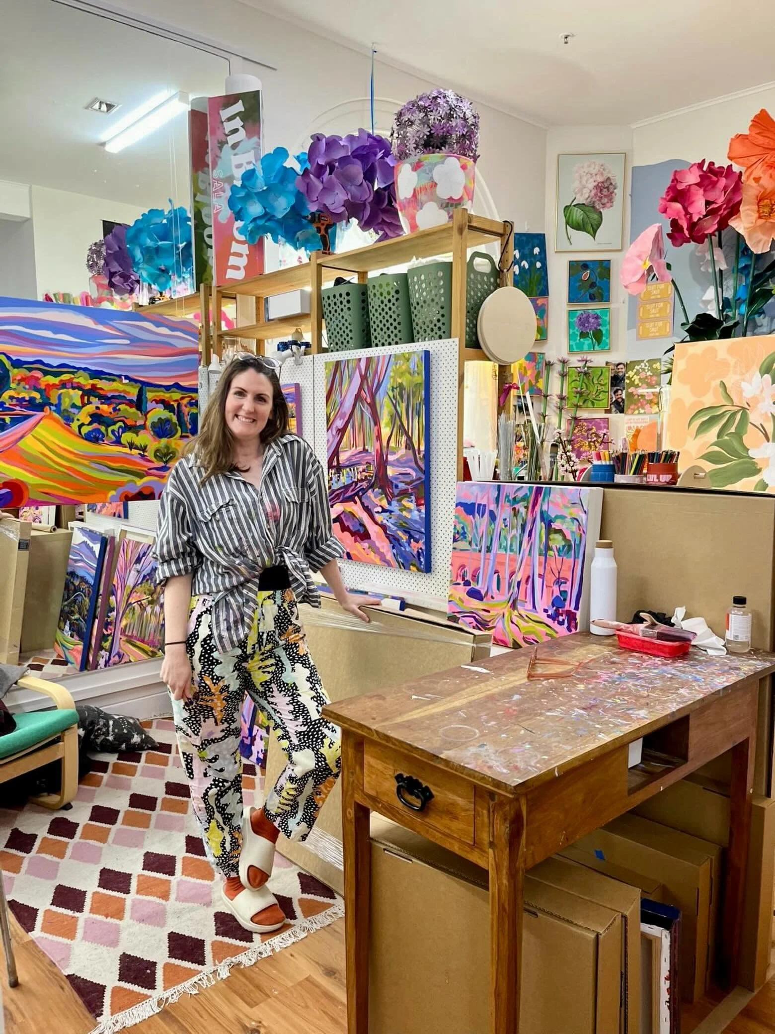 Had the lovely @courtneymikaela_art visit my studio space at @the.rundle.collective today! Thank you for the photos, capturing me in my happy place 🤗 the suuuuuper colourful corner next door to @pottymouthdesigns 😘 
.
.
.
.
#artstudio #adelaidearti