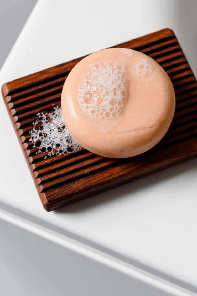 pink shampoo bar on rack