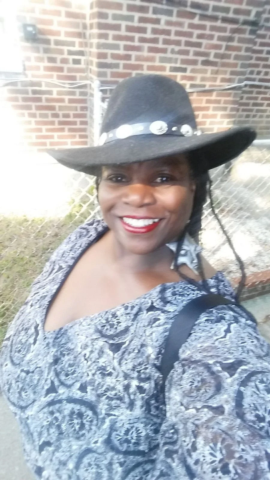 Barbara black white shirt with black hat.jpeg