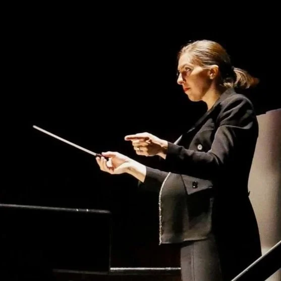 Conductor conducts opera, gives birth, conducts more opera