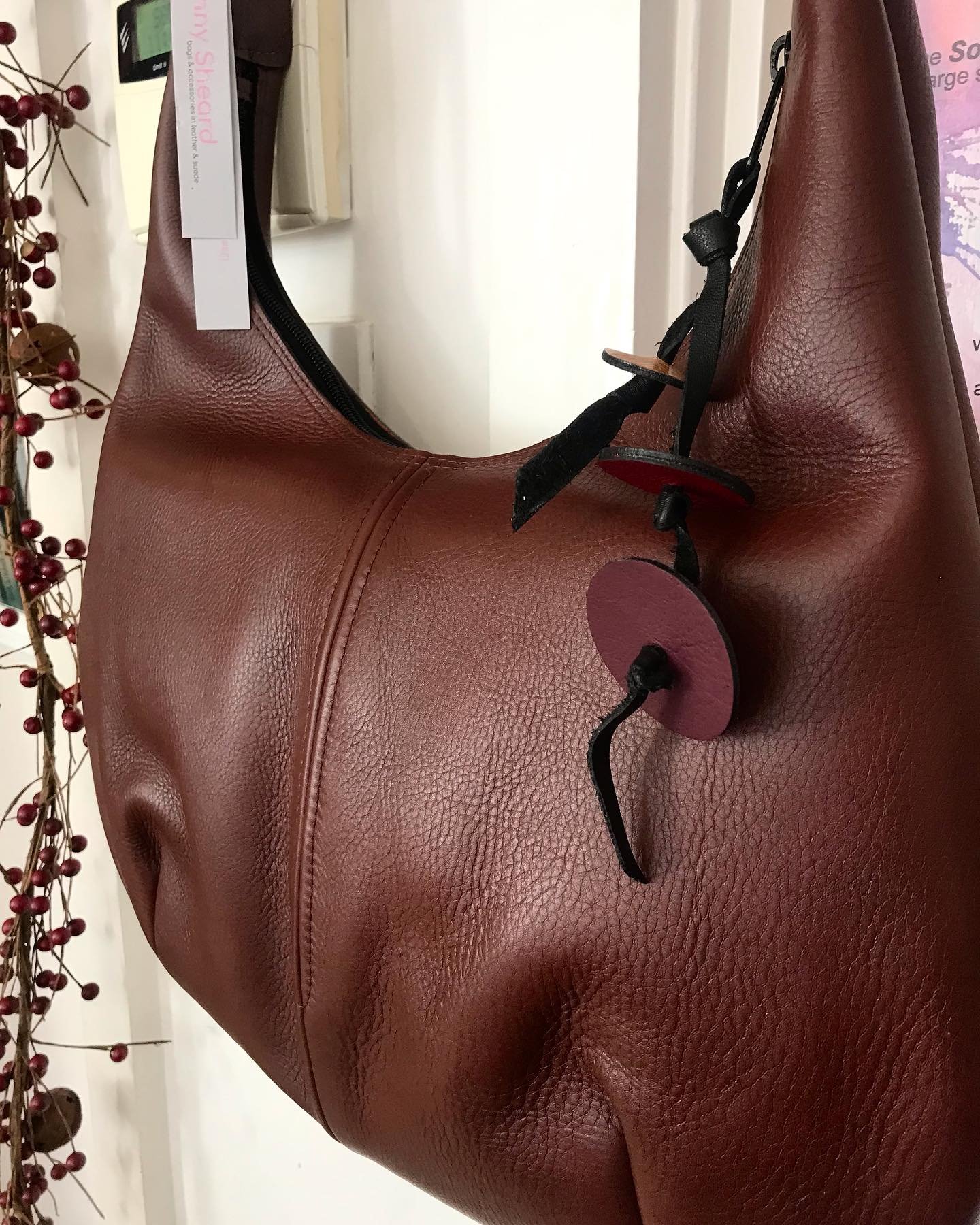 Leather bags handmade by Penny Sheard have just arrived. This one is a classic - comfortable, zipped top and wide shoulder strap, large enough to fit lots in and not too bulky.  Brown cowhide one of a kind which will last for years &pound;133.00
