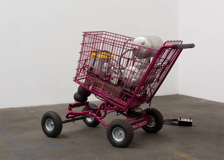  Rubén Ortiz-Torres  Shopper Hopper , 2016 mixed media, chromaluscent paint and flake on shopping cart with hydraulics 42 x 40 x 36 in (106.7 x 101.6 x 91.4 cm) 