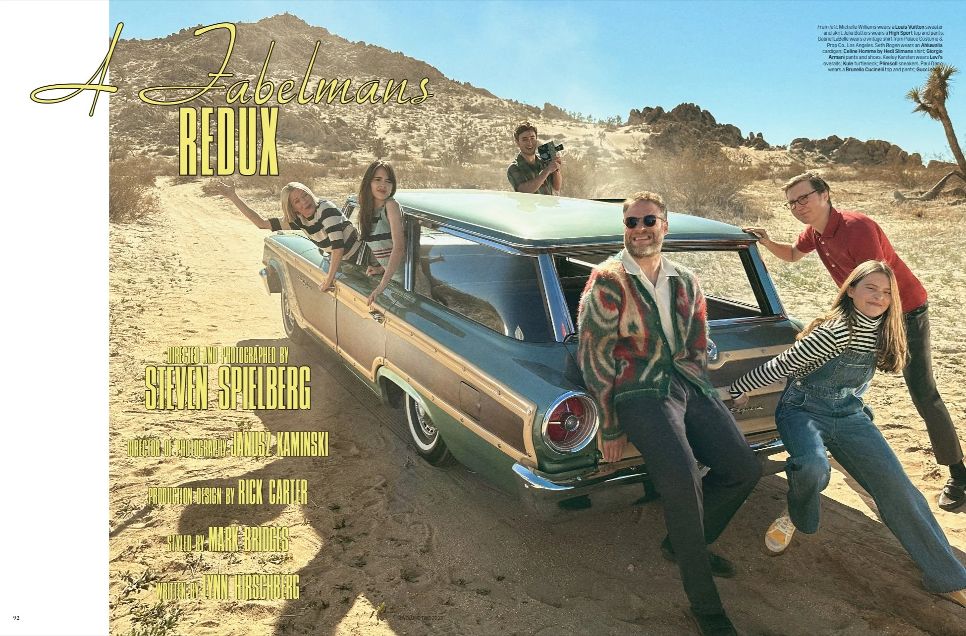 The cast of The Fabelmans poses with a vintage station wagon in the California desert.
