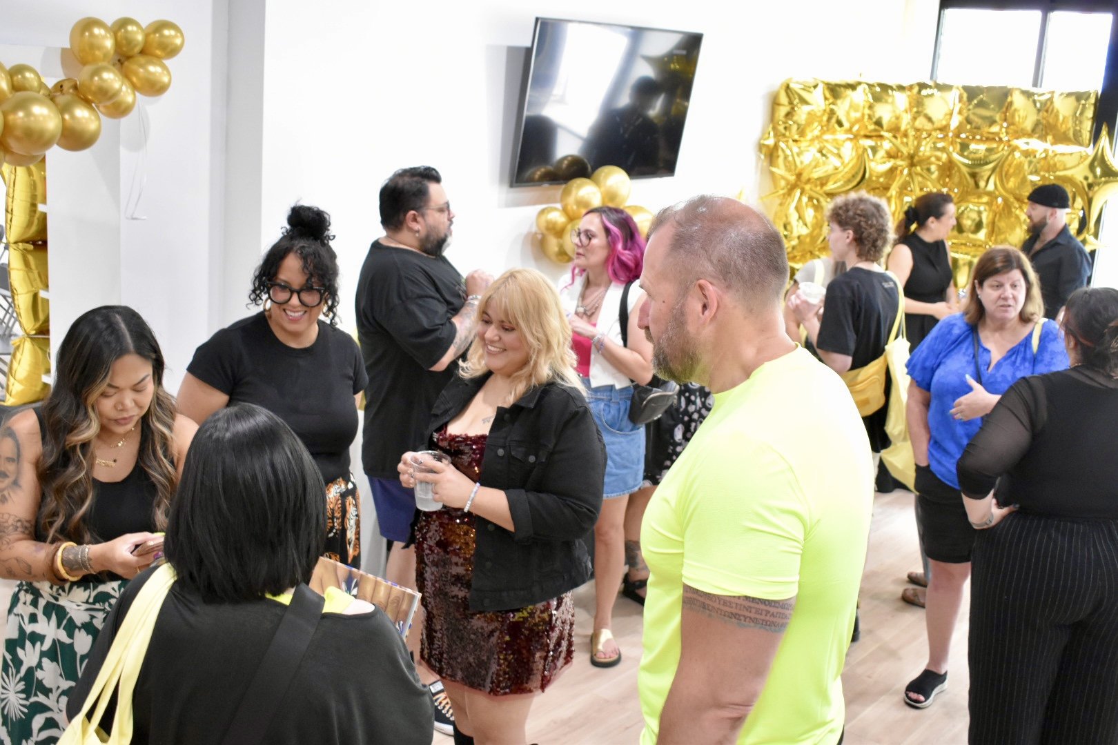 Nail artists chatting and networking during The Mani Mixer 2026 before the expert panel discussion.