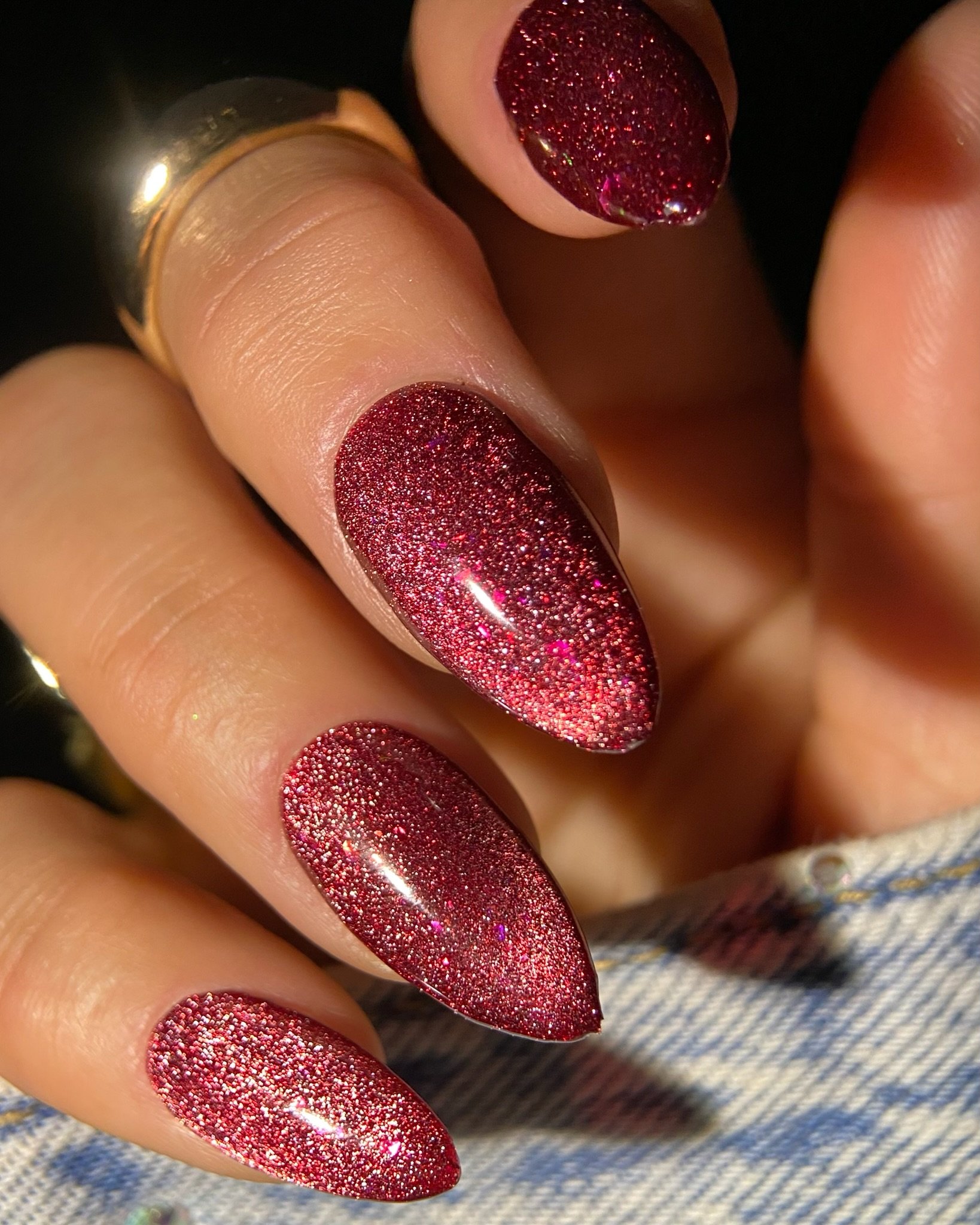 Close-up image of manicured hand with magnetic nail art featuring the Nail Thoughts Zodiac Collection