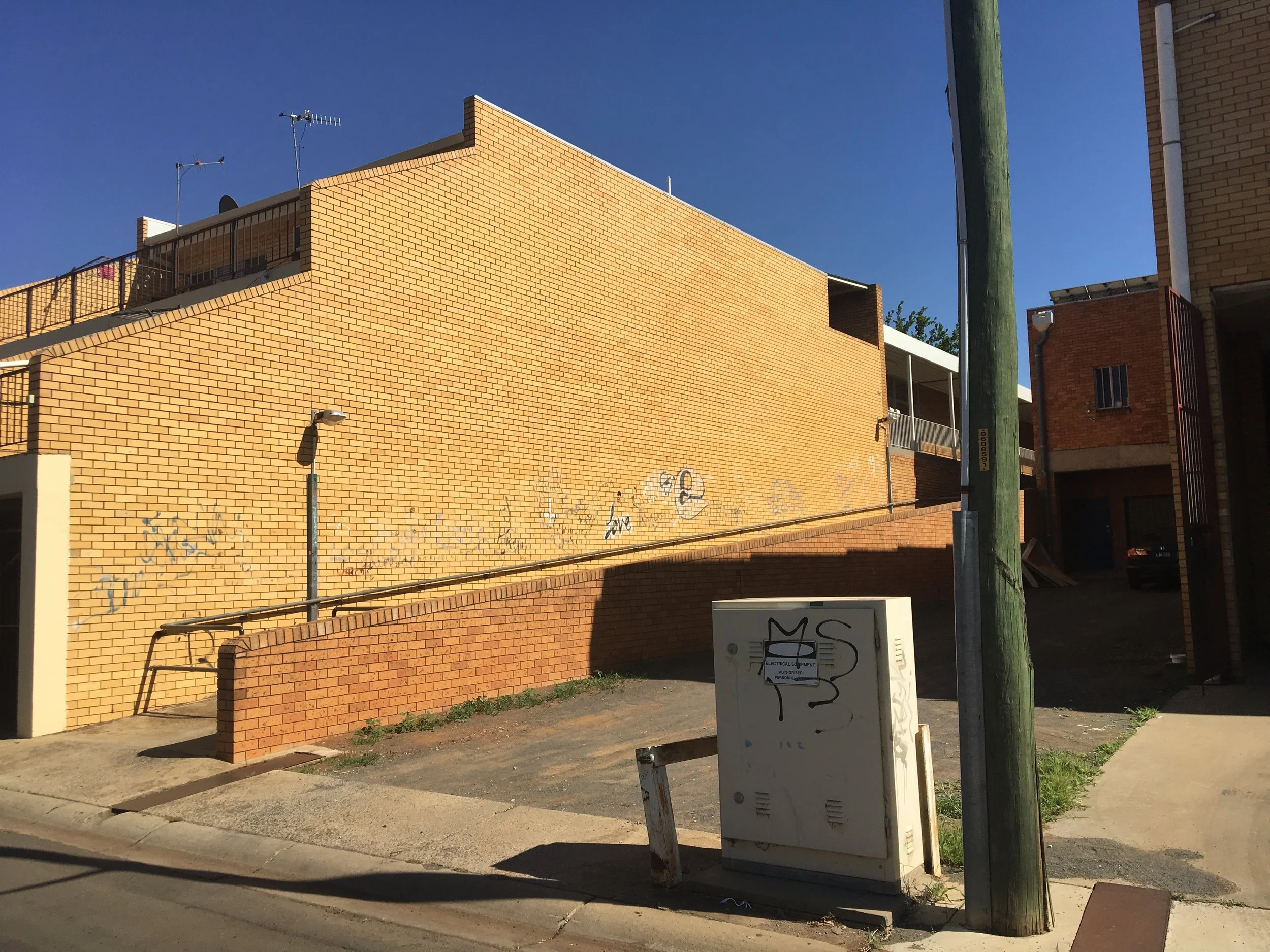 Back of 420 Banna Avenue, side 1