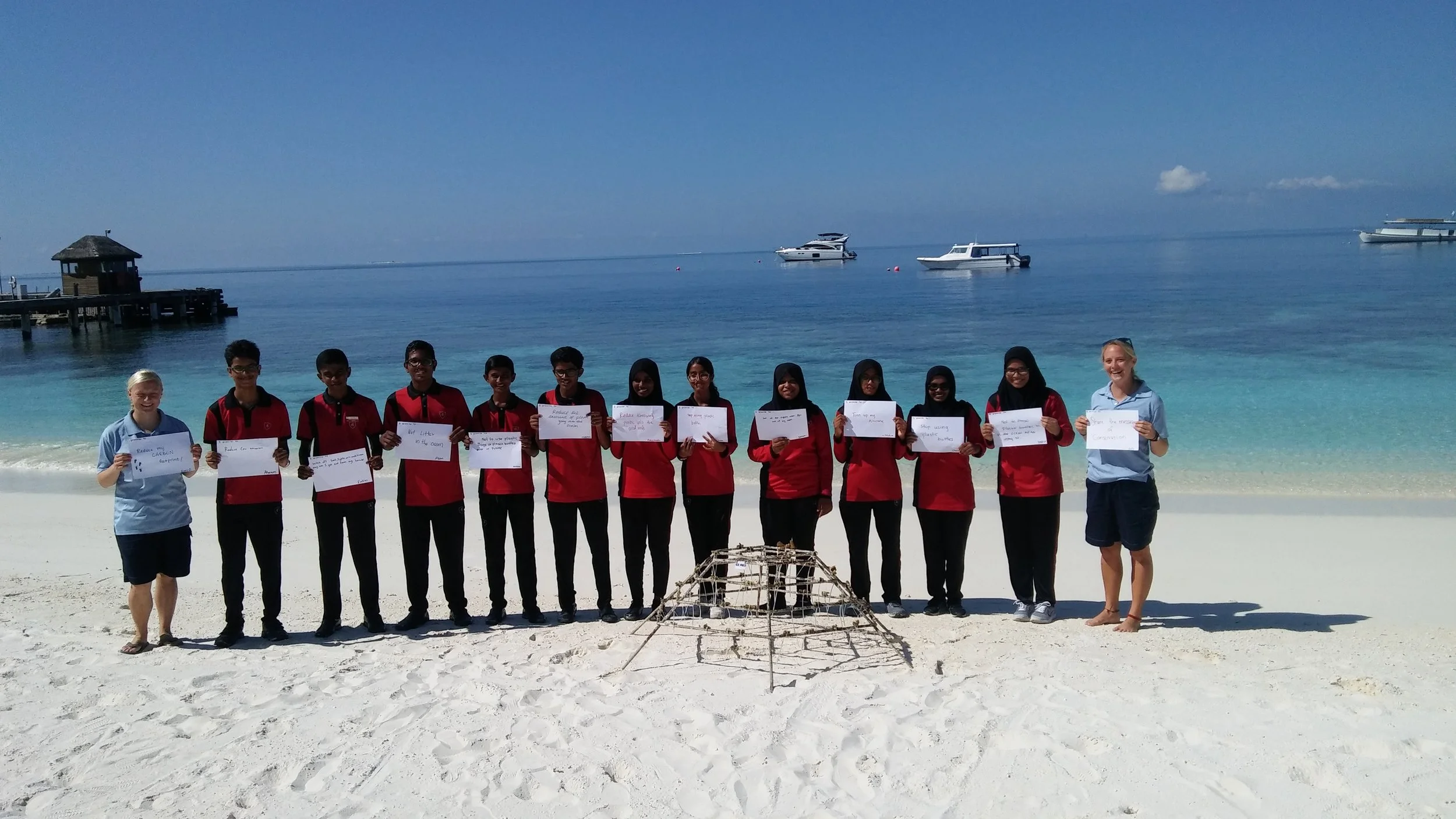 Coral propagation with a group of students for world Tourism day; training for coral propagation program. Photo: Emily Moxham @sustainablemoxi