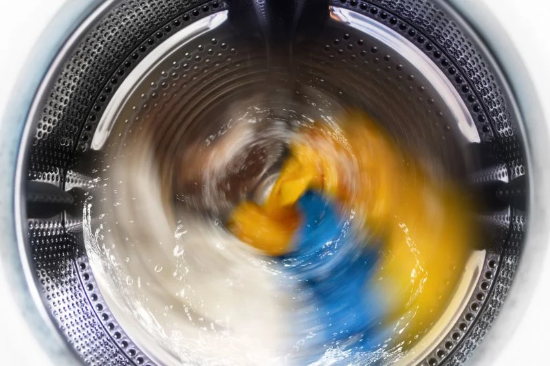 Synthetic clothes release microfibres when washed. Photo: Friends of the Earth