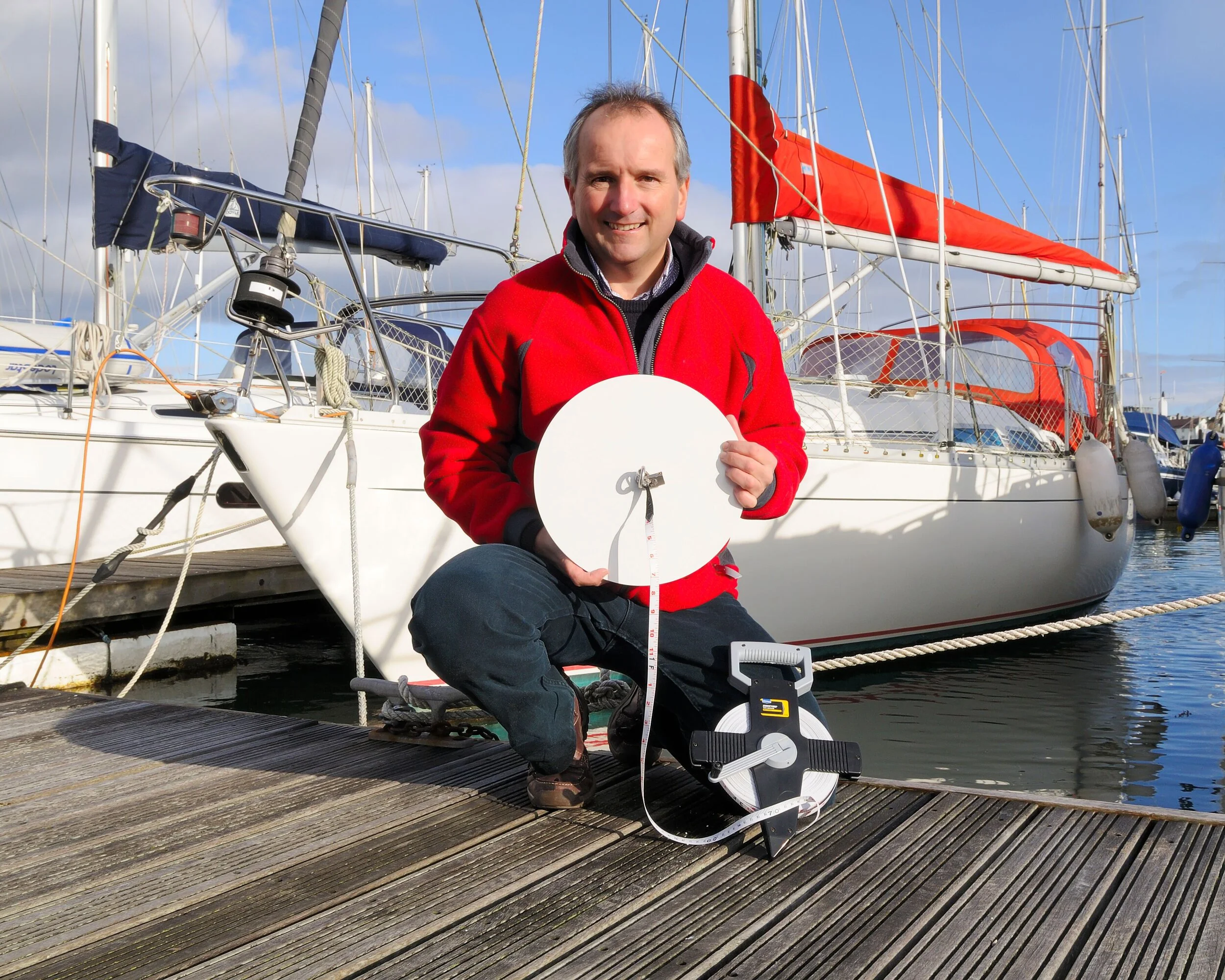 Dr Richard Kirby and a Secchi Disk. Photo: Richard Kirby, The Secchi Disk Study