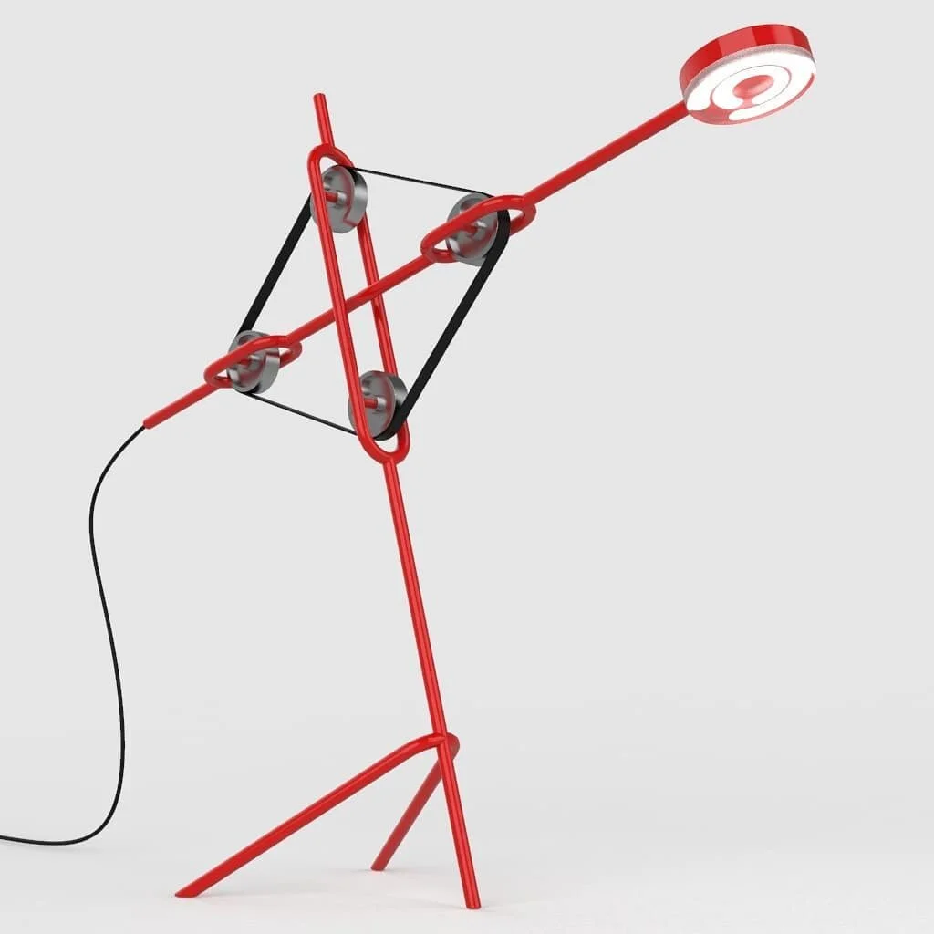 A playfull suspended floor lamp.
The angle of the lamp is held in place by the friction and tension of the rubber band. This allows the light to be directed and adjusted to suit the user. This fun and energetic floor lamp was inspired by children's p