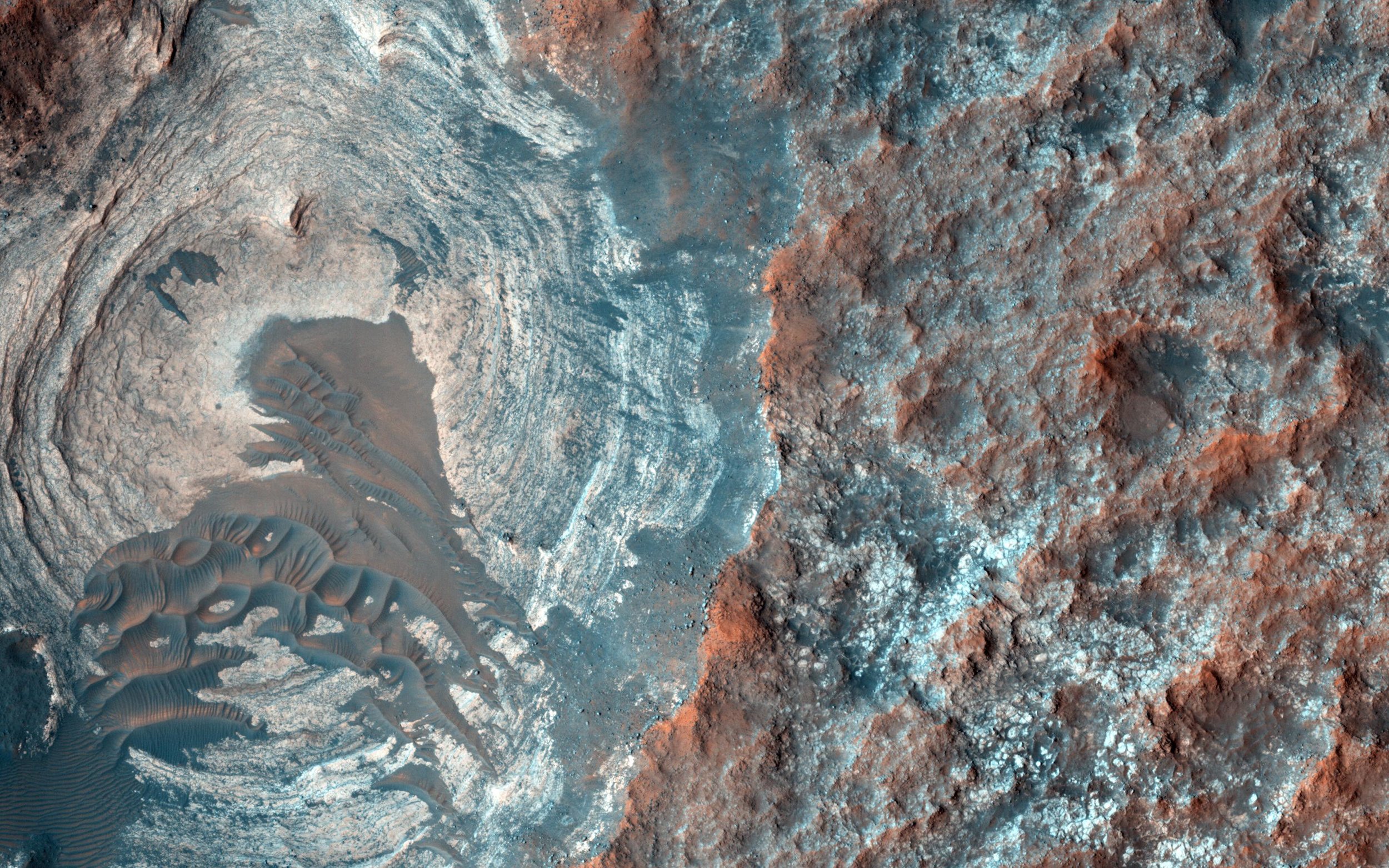 The Martian surface, from orbit, doesn’t appear too dissimilar from Earth. Photo credit: NASA