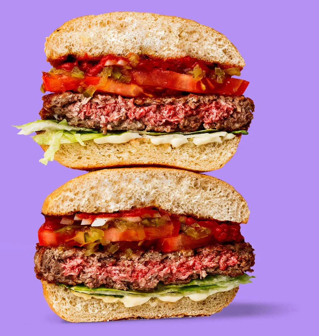 Despite how it looks, this burger is 100% vegan, made with algae that produce bovine heme and giving it a bloody look. Photo credit: Impossible Foods