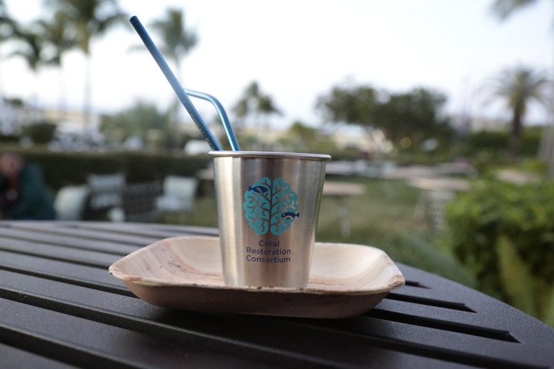 No single-use plastics were used at the conference. Attendees were given a stainless steel cup and straws, and food was served on bamboo plates. Photo by Sara Nilsson, Coral Restoration Consortium.