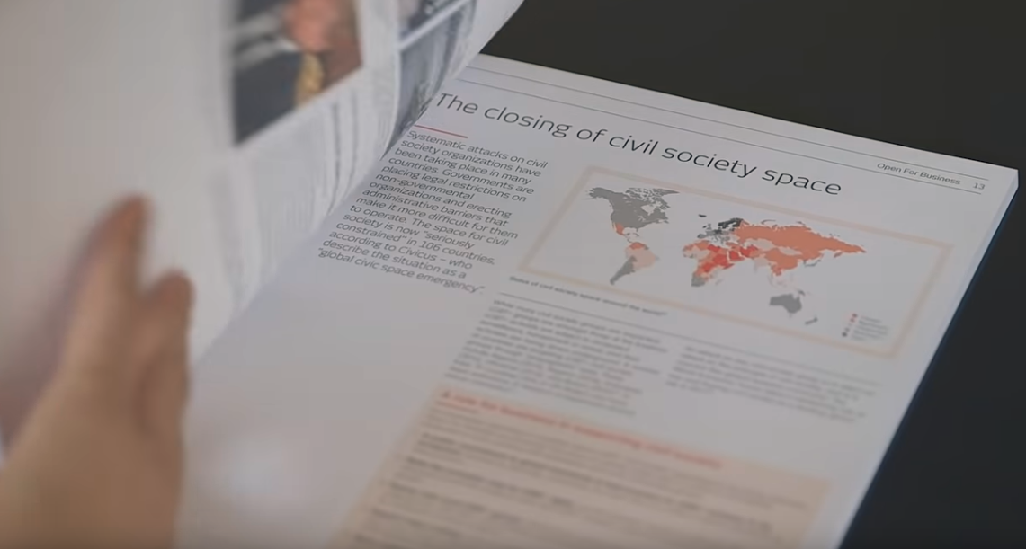 Pic of someone reading report.PNG