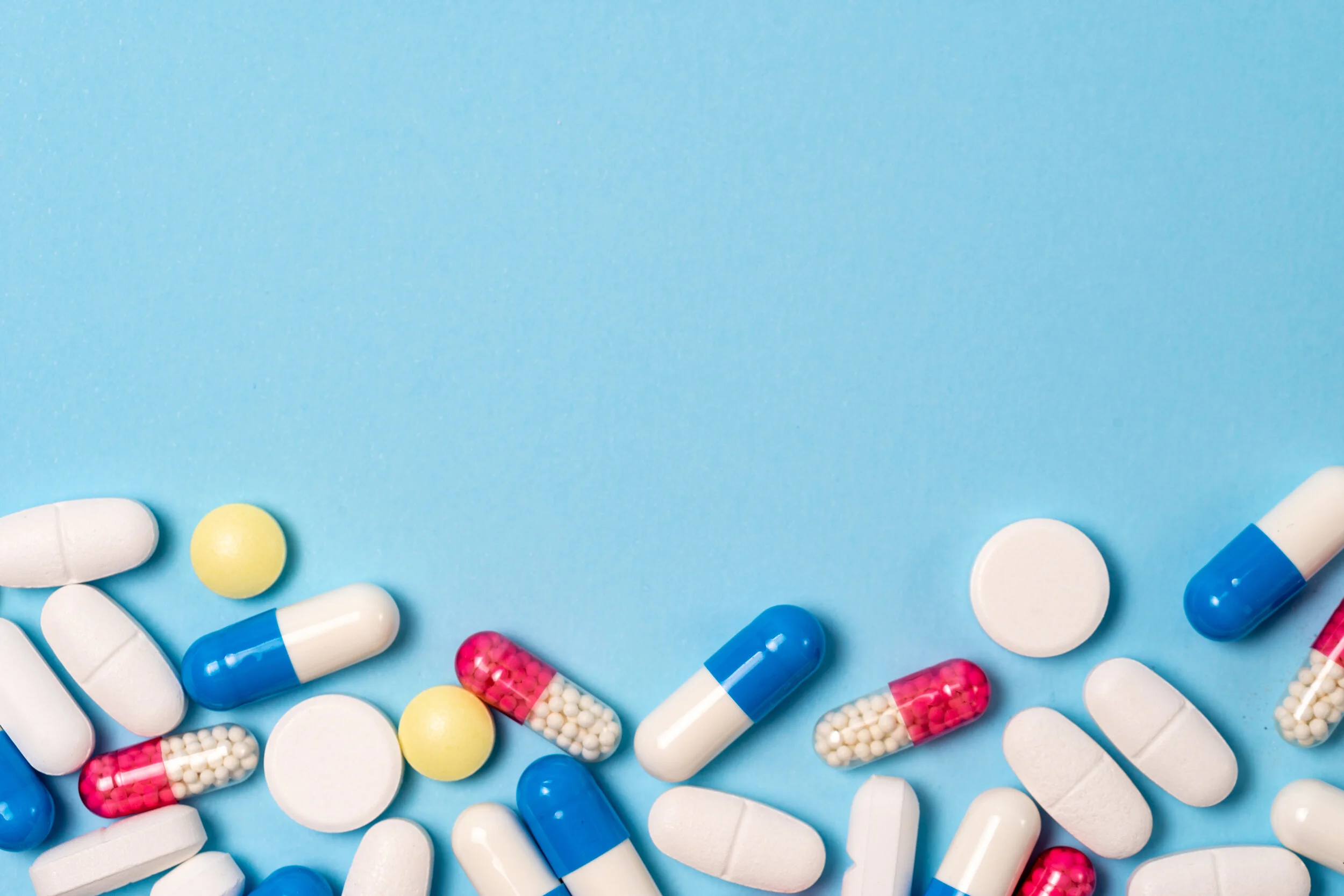 Studio shot of medical pills on blue background