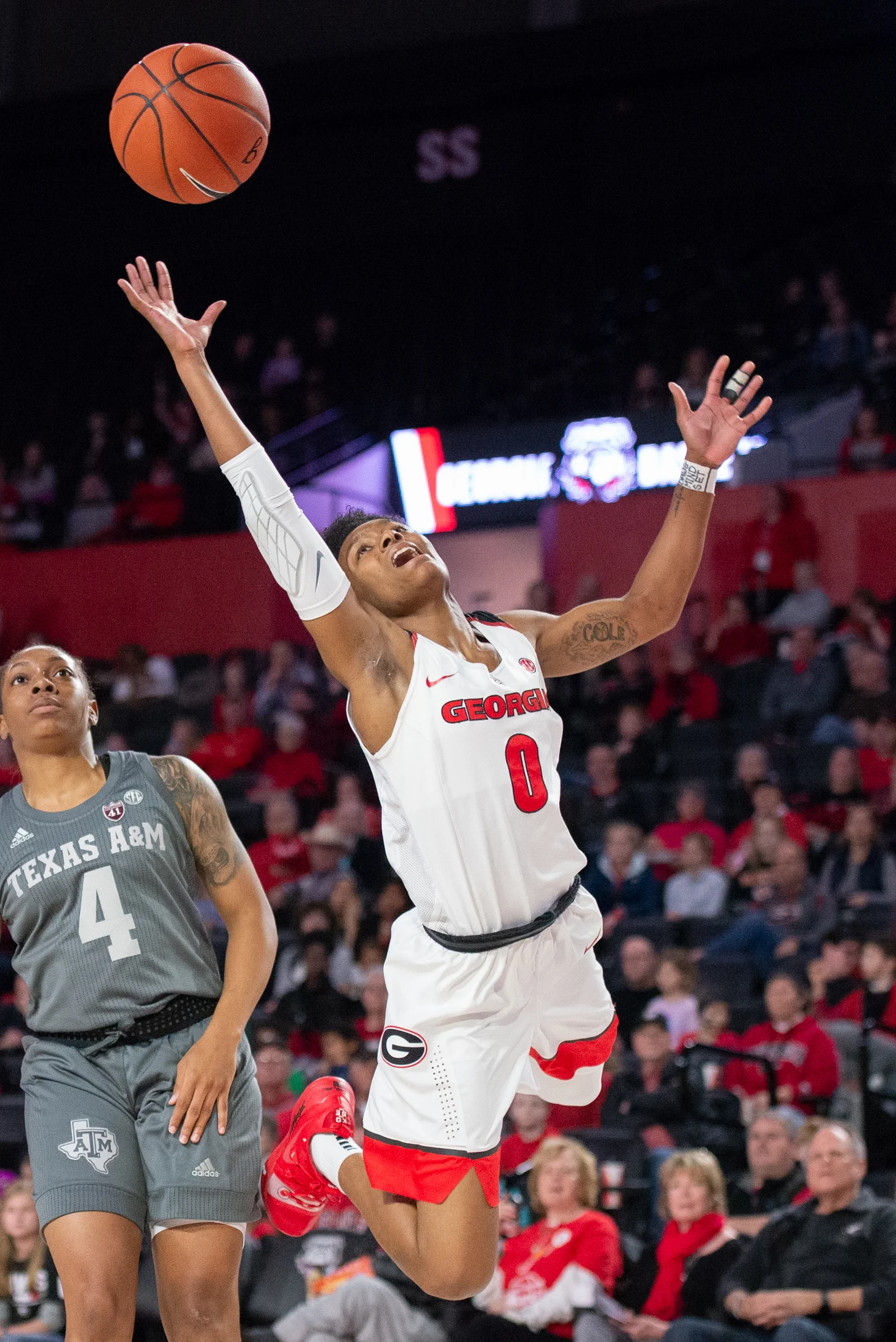 University of Georgia guard Taja Cole (0), a red-shirt junior from Richmond, Virginia, reaches for the ball during a game against Texas A&M University on January 20, 2019 in Stegeman Coliseum in Athens, Georgia. The Lady Dawgs narrowly lost in the final quarter 76-66. (Photo/Julian Alexander)