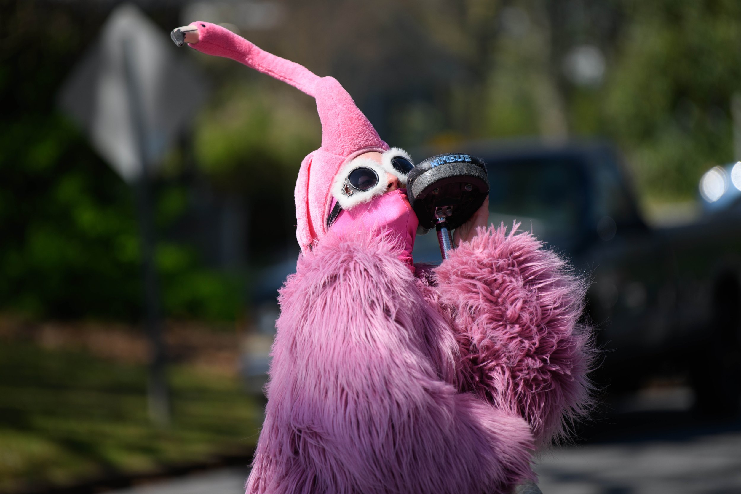  The Pink Flamingo poses for a portrait on Saturday, March 20, 2021 near Nantahala Avenue in Athens, Georgia. The Pink Flamingo is a performance artist. (Julian Alexander for the Athens Banner-Herald) 