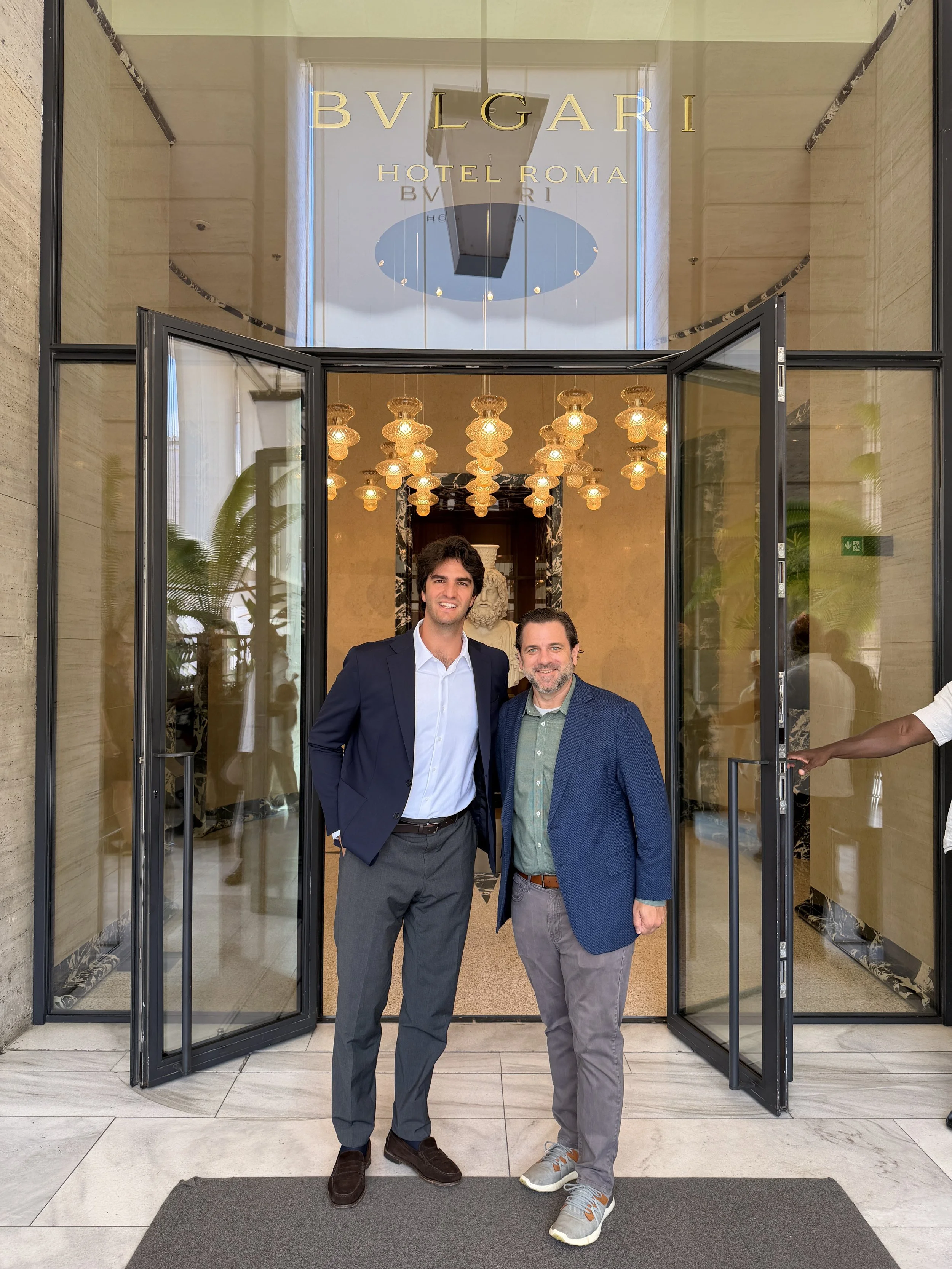 Matt with a hotel partner at the entrance to Bvlgari Hotel Roma