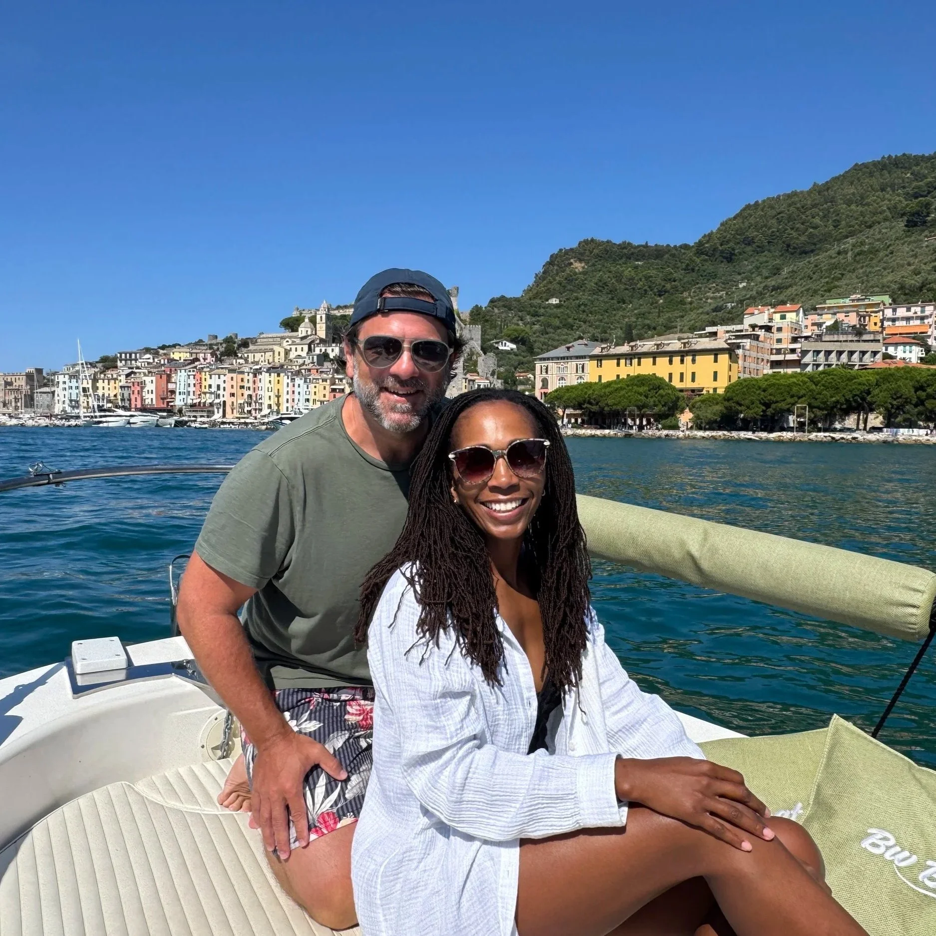 Matt and Amina on a boat in Italy