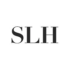 A photo of a the logo for Small Luxury Hotels, SLH Preferred Partner, Amina Dearmon, New Orleans