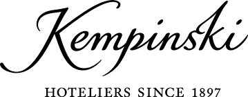 A photo of the Kempinski Logo, Kempinski Preferred Partner, Amina Dearmon, New Orleans