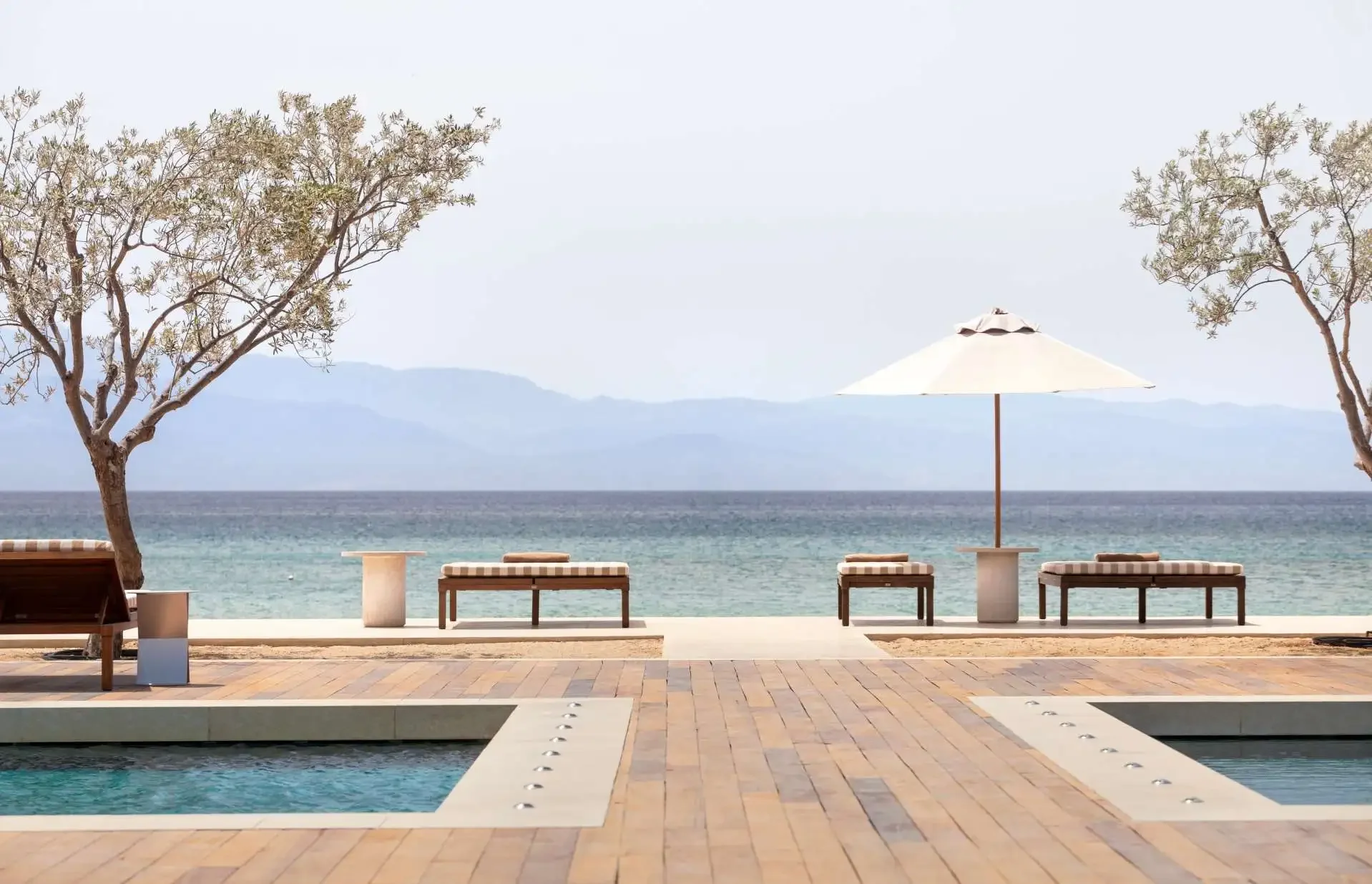 A photo of Amanzoe Greece with hotel perks, VIP amenities, Amina Dearmon, New Orleans