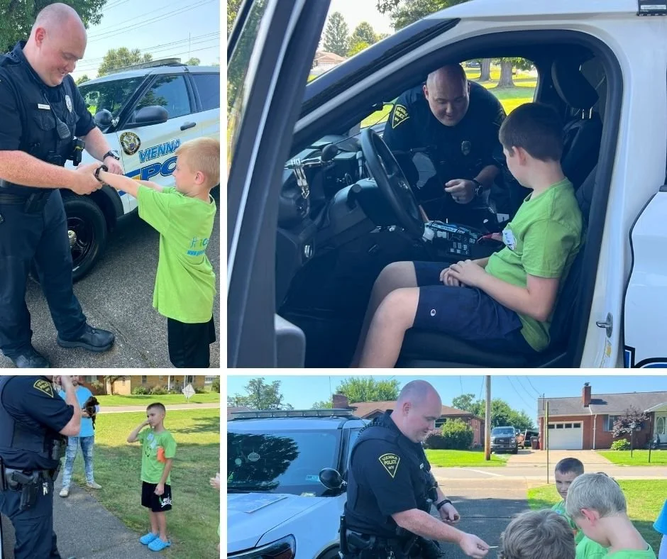 iconnect-police-visit-fist-bump-and-gear.jpg
