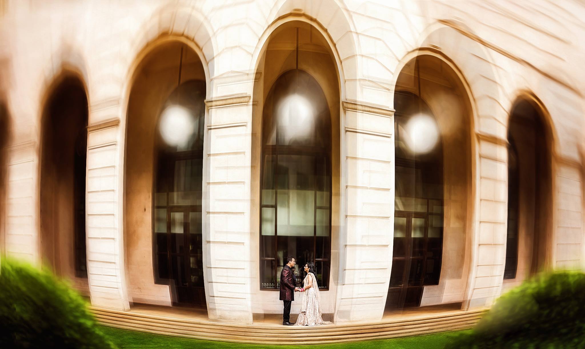 indian bride and groom outside wedding venue ofGuildhall Great Hall - City of London photographer