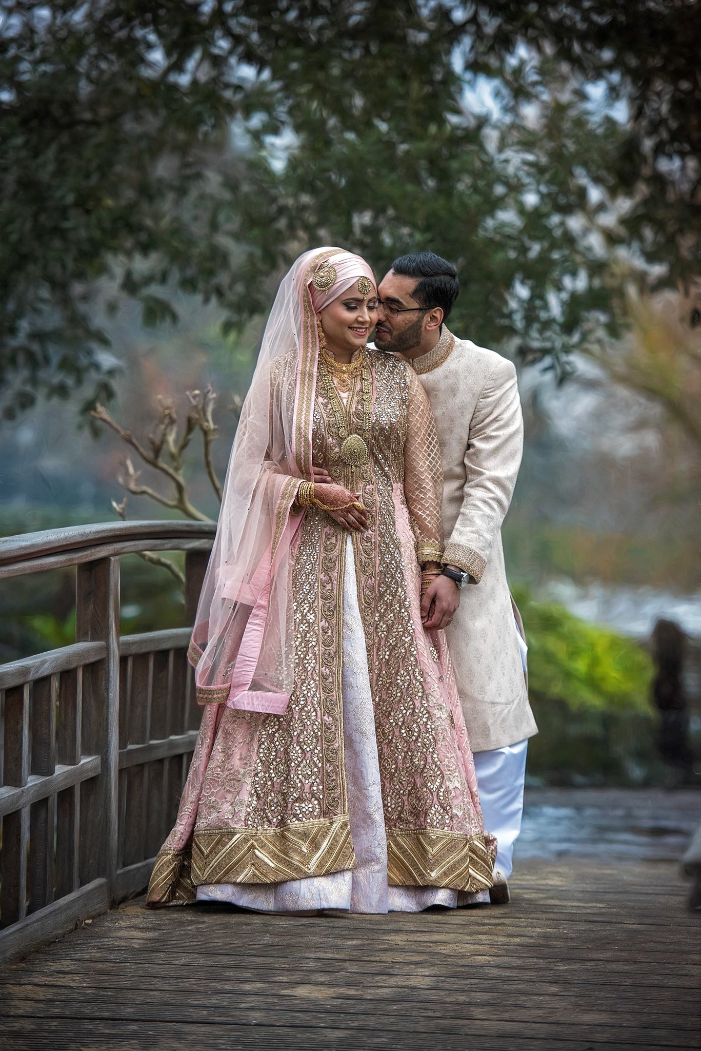 Photo portrait of asian bride and groom, bride wearing a lovely asian wedding dress