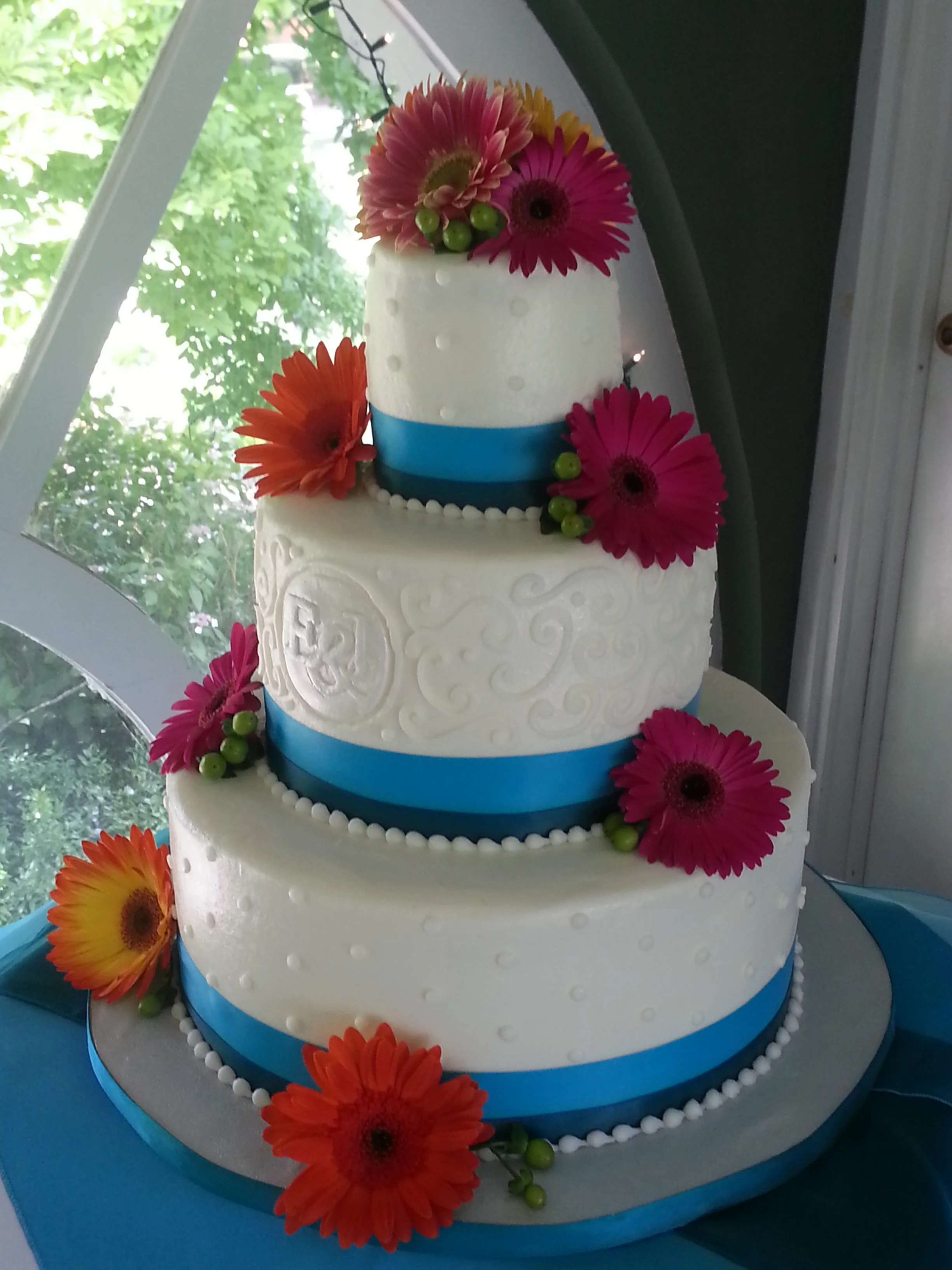 Colorful Gerber Daisy elegant wedding cake