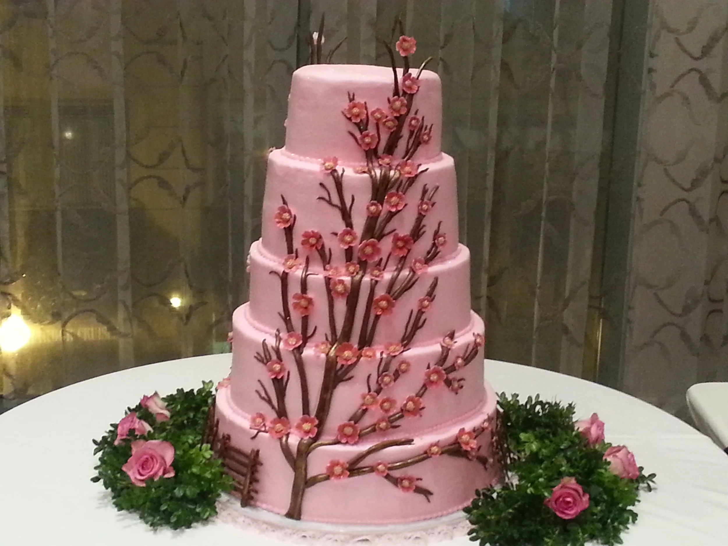 Cherry-blossom pink wedding cake