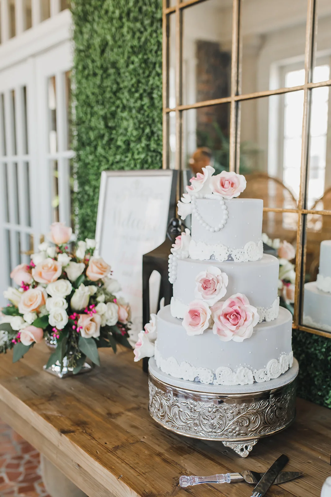 elegant, white, pink-centered roses beach wedding cake