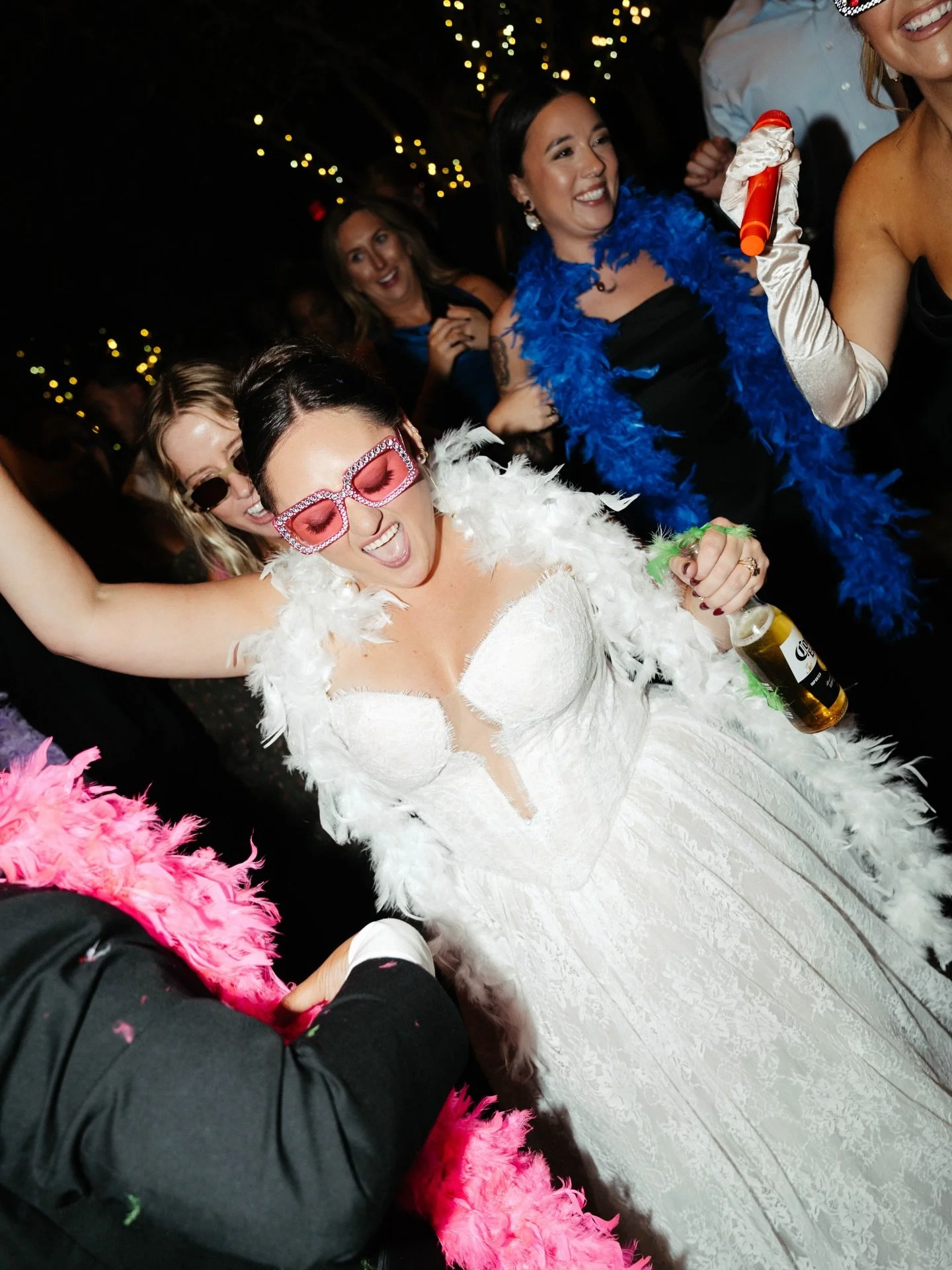 They break the ice, get guests involved, and give everyone permission to let loose. From glow sticks to hats to signs&hellip;props create moments, energy, and photos your couple will relive forever.
When the dance floor feels playful, people stay lon